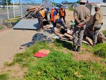 Law Enforcement Officials demolish unsafe informal structures in Qolweni 